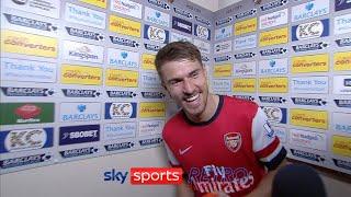 Lukas Podolski walks off with Aaron Ramsey's Man of the Match award