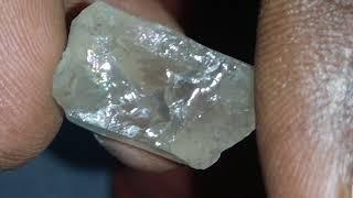 Rough Topaz stone or Raw diamond?? 