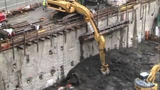 Cat 385CL Excavator loading mud to the max