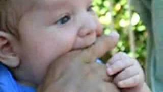 TJ chewing Grandpa Joe's finger