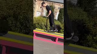 Taktika.lv Scooters PRO team rider Roberts banging some nice triks on cars's hood