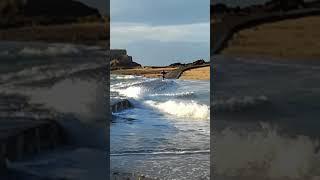 Getting wet over bridge crossing!!  The sea and tide was coming in!  Saint Malo, france