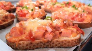 Горячие бутерброды с помидорами колбасой и сыром