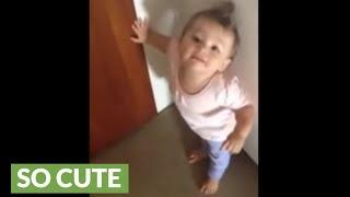 Babbling baby refuses to let dad walk out the door to work
