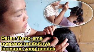 Petan Tumo ama ngepang rambutnya incesque yang pendek