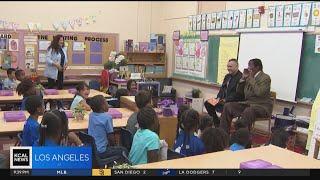 Jim Hill reads to kids at Bolts Book Club