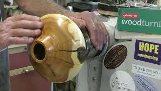 Mike Waldt turns a Yew Hollow Form