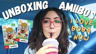 opening amiibos and drinking boba in my car
