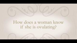 How does a woman know if she is ovulating?