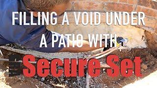 Filling a Void Under a Concrete Patio  with Secure Set Spray Foam