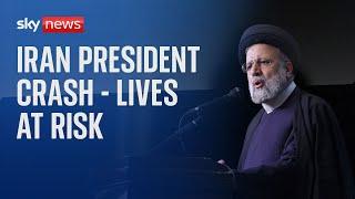 Lives of Iran's president and foreign minister 'at risk' as search effort under way following crash
