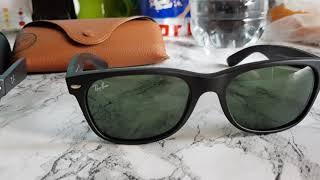 Ray Ban wayfarer 2132 polarized  vs the non polarized one (2132 g15 green lens black rubber frame)