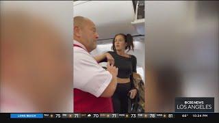 Passenger kicked off Delta flight after throwing bottle at flight attendant, smashing onlooker's pho