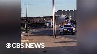 Video shows freight train derailing after crashing into tractor-trailer in Texas