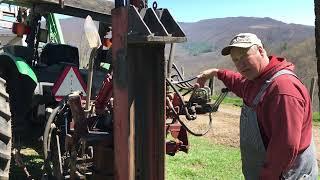 Driving large locust fence post with homemade post driver.