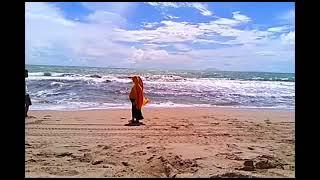 romantic muslim couple on beach