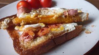 Crispy toast  with egg inside. Very  simple breakfast.