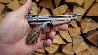 Miniature CROSMAN air pistol