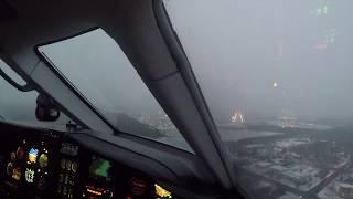 Pilatus PC-12 landing in low visibility and snow (4K Ultra HD)