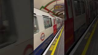 London Underground Bakerloo Line train arrives at Piccadilly Circus