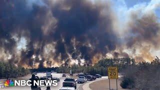 Firefighters rush to contain massive brush fire on Long Island