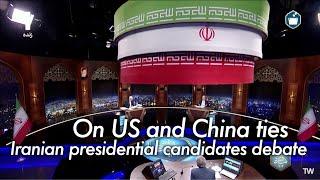 Iran's presidential candidates debate over foreign policy and sanctions as citizens focus on economy