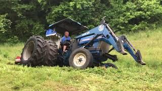 Extreme bush hogging steep ground on a rear wheel drive tractor