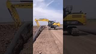 The process of installing electrical network pipes on the side of a toll road under construction