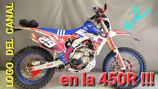 CAMBIANOS LAS CALCOS DE LA 450R POR UNAS CON EL NOMBRE DEL CANAL .