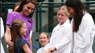#princessofwales places caring hand on #princesscharlotte as she guides her to greet #wimbledon team