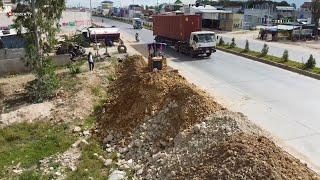 Best Technique!! filling Flooded land Next to the road Use D31P KOMATSU Dozer And Small Dump Trucks.