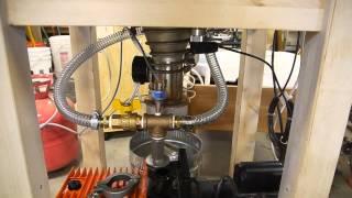 Progress on vacuum chamber build - helium leak detection, custom flanges