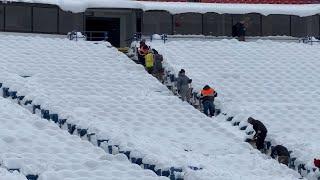 Bills fans shovel snow