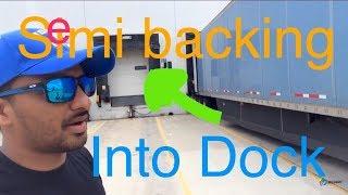 How to Back a Semi Truck into a Warehouse Dock