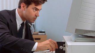 Planting the virus and checking the bank account balance – Office Space (1999)