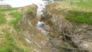 Weimer Lake drains into a sinkhole (00054)