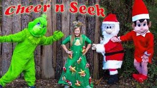 Assistant and Elf on the Shelf play Holiday Cheer in Seek with the Grinch