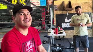 Vergil Ortiz sr and Hector Beltran at the gym