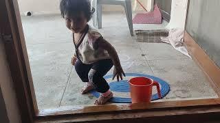 Thanu helping her mom in cleaning home