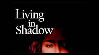Trailer Living in Shadow