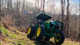 Pulling Some Storm Damaged Trees! First Wheelie with the New Tractor.