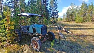 1923 Model TT Tractor Skidding Logs