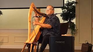 Ray Pool describes "harp therapy" in his 8th annual retirement concert.