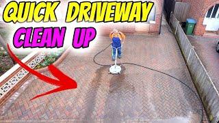 Small block paved driveway pressure washed