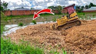 Update project showing Push Land Filling Up by Dozer KOMATSU D31P with Dump truck 5 tons