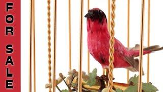 Automata for sale depicting singing birds including this Reuge cage with two singing bird automatons