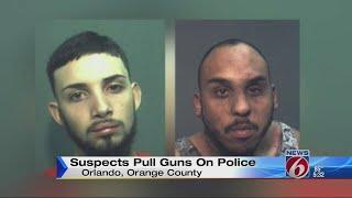 Suspects pull guns on police