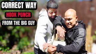 Correct way to block a hook punch from the big GUY