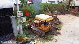 Bulldozer pushing Dirt to delete big grass develop land build foundation unload by dump trucks 5TON