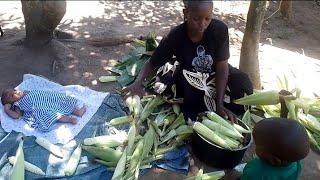 Life style of an African mom cooking with her children//African village life